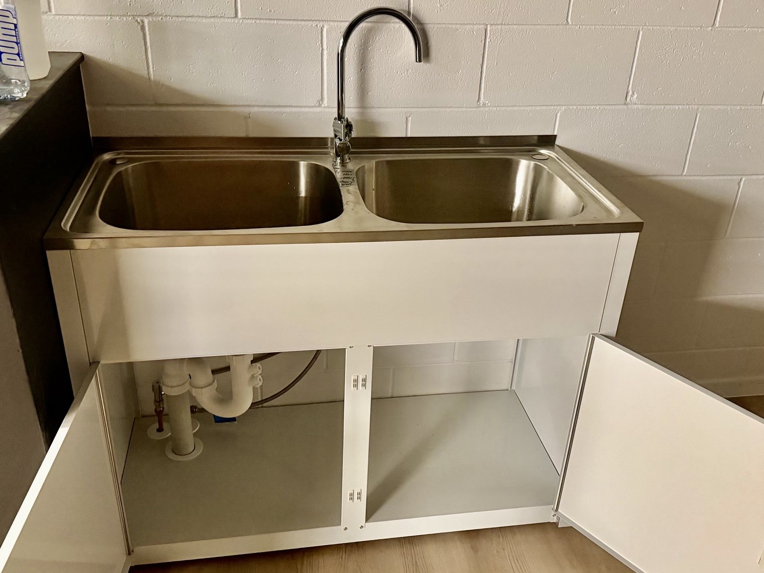 Commercial stainless steel sink installation